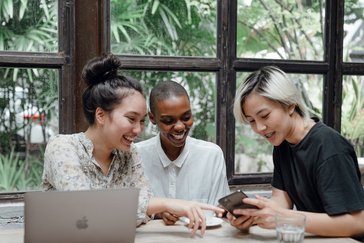 women looking at phone