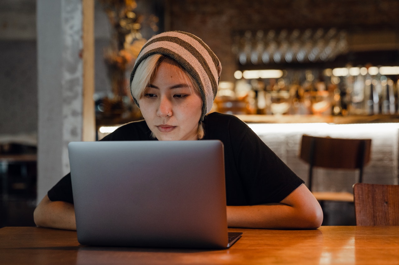 woman watching on laptop